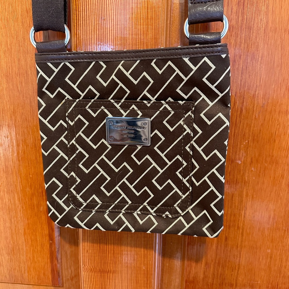 Tommy Hilfiger brown and cream cross body fabric purse with brown strap.